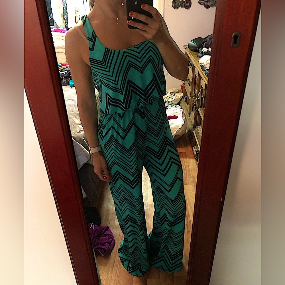 Light mint green chevron sleeveless jumpsuit romper with bell bottoms - size M